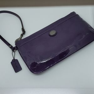 Large purple patent leather coach wristlet